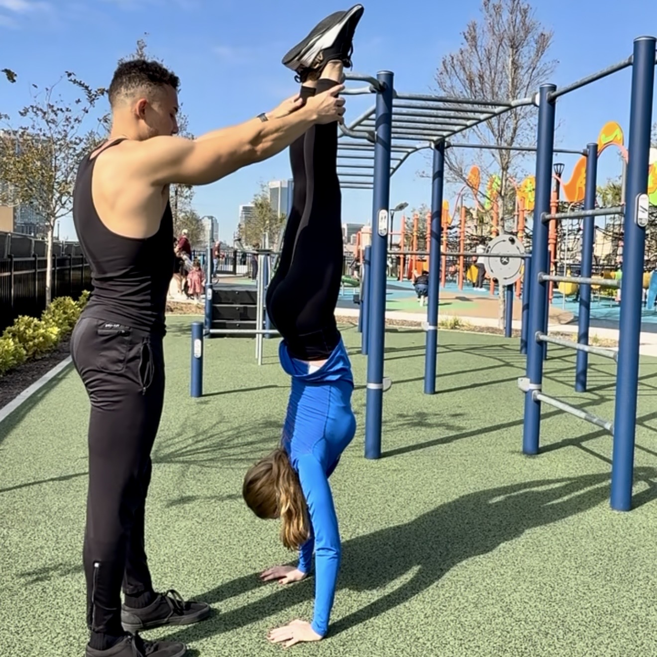 JAXTHENX coaching assistance during a movement progression