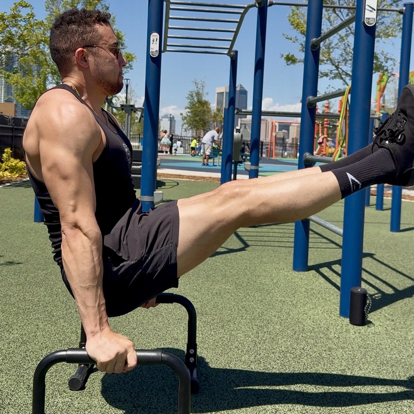 JAXTHENX controlled strength hold on calisthenics bars